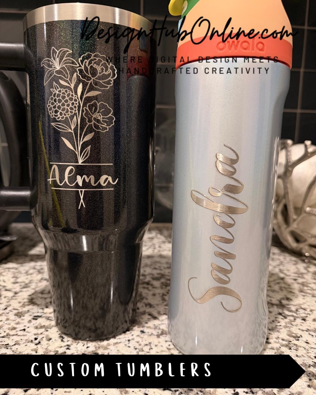 Two custom tumblers with personalized names on them, one black and one silver, sitting on a countertop.