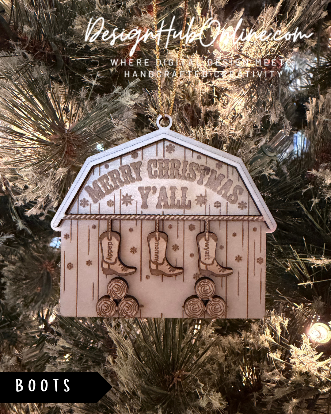 A wooden ornament with the text "Merry Christmas Y'all" and three cowboy boots hanging from a tree branch.