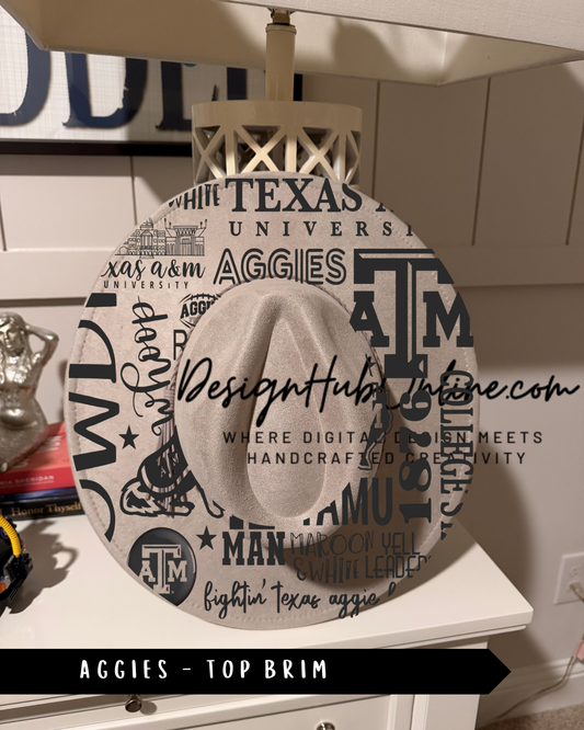 A hat with the words "Texas A&M University" printed on it, sitting on a white surface.