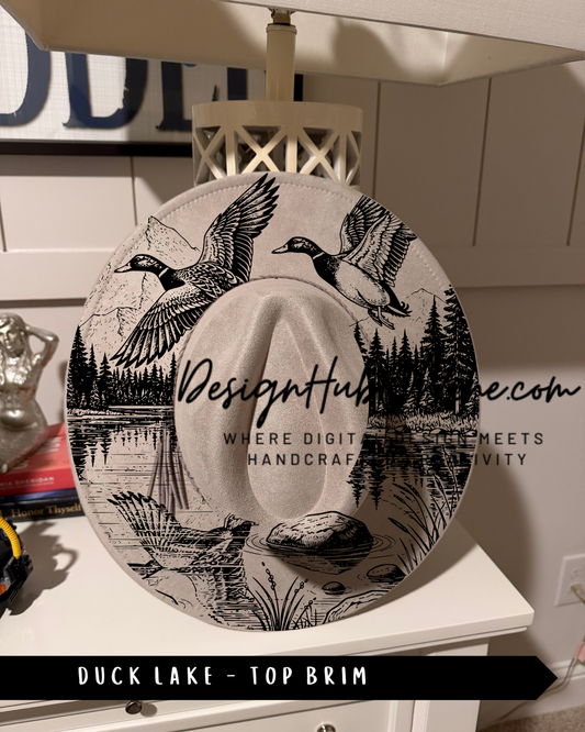A hat with a printed design of ducks and a lake, along with the text "Design Hub" and "Where digital meets handicraft".