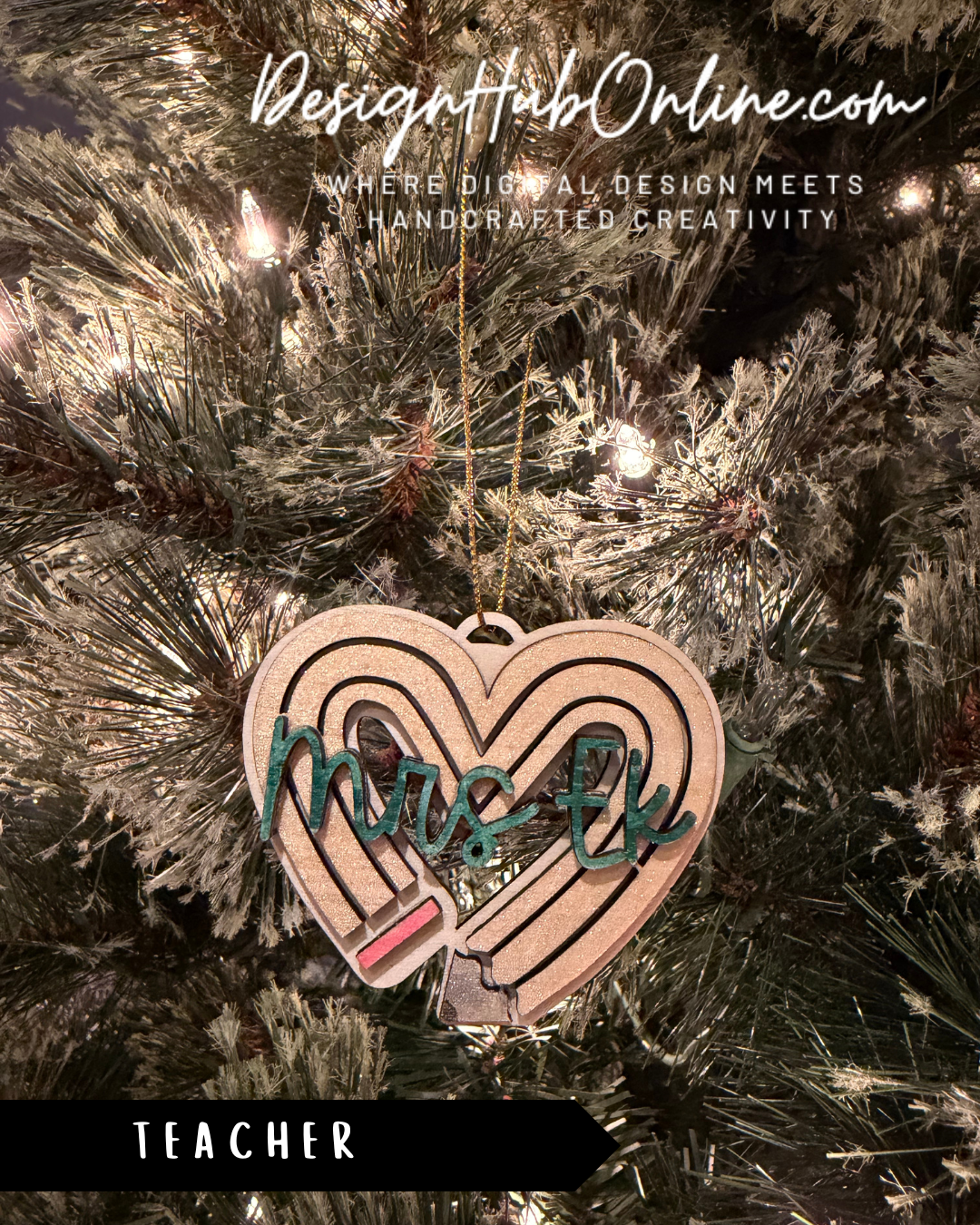 A heart-shaped ornament with the word "Mrs. EK" written on it, hanging from a Christmas tree.