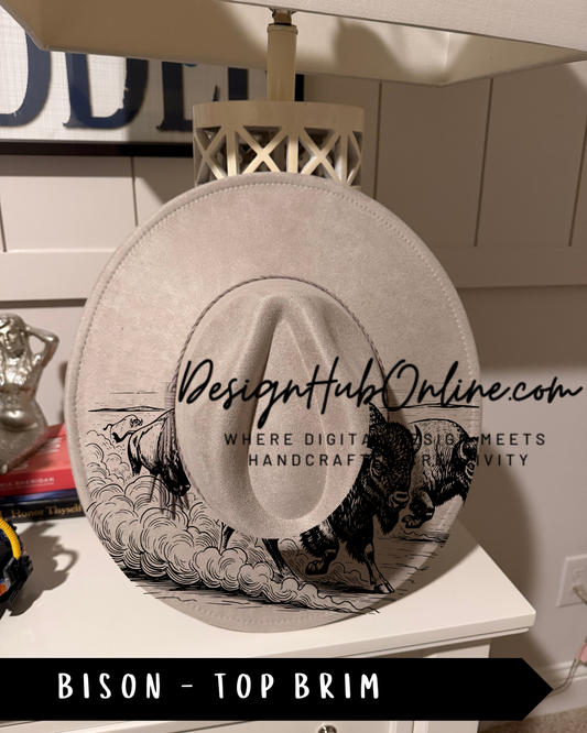 A white hat with a graphic of a bison on it, placed on a white surface.