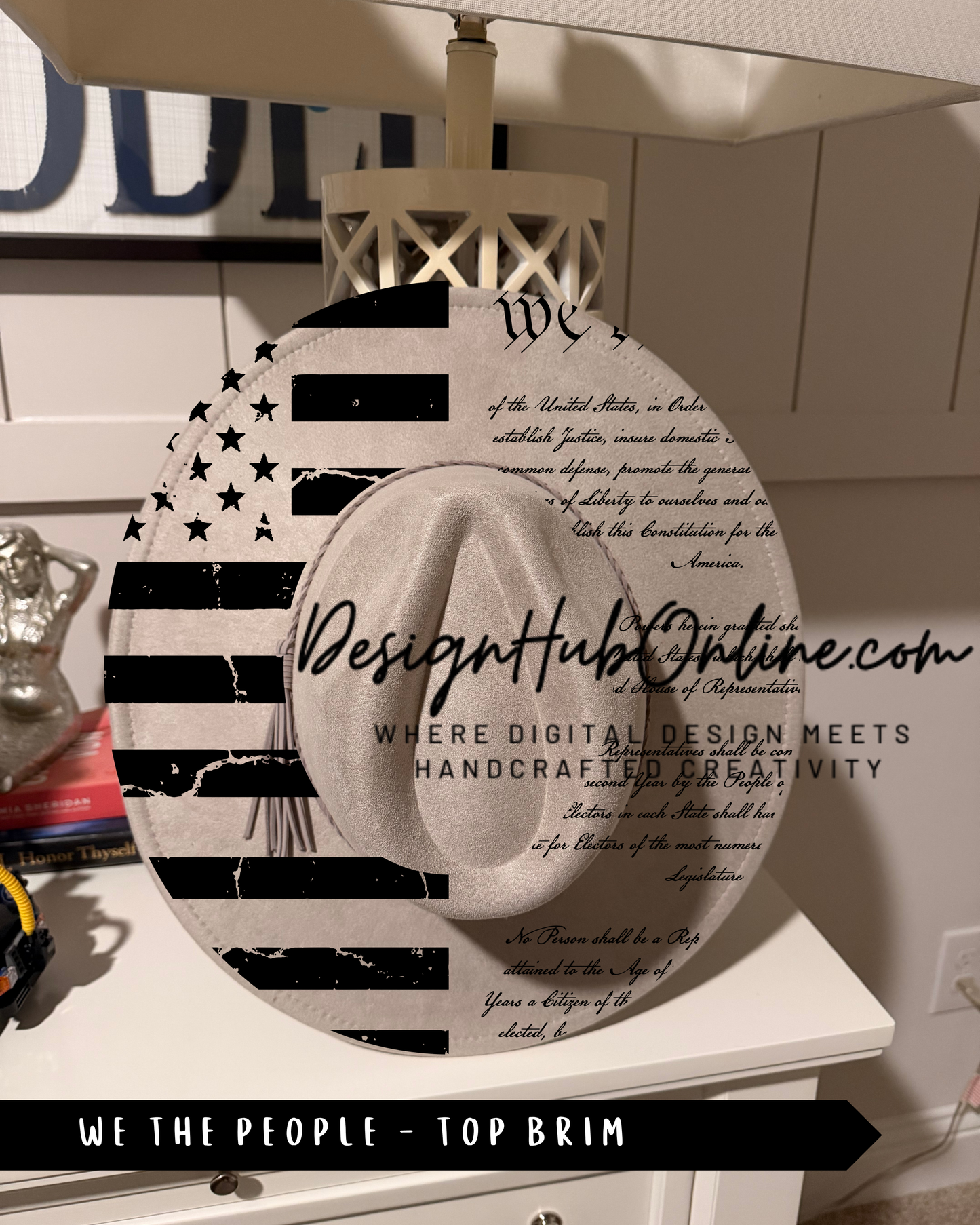 a hat with an American flag design, along with text that reads "Design Hub Online" and "We the People - Top Brim".